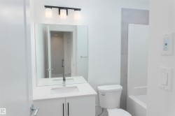 Full bathroom featuring vanity and bathing tub / shower combination - 