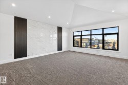 Carpeted spare room featuring recessed lighting and lofted ceiling - 