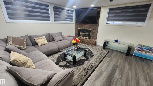 115 Ekota Crescent, Edmonton, AB - Indoor Photo Showing Living Room With Fireplace