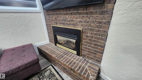 115 Ekota Crescent, Edmonton, AB - Indoor With Fireplace