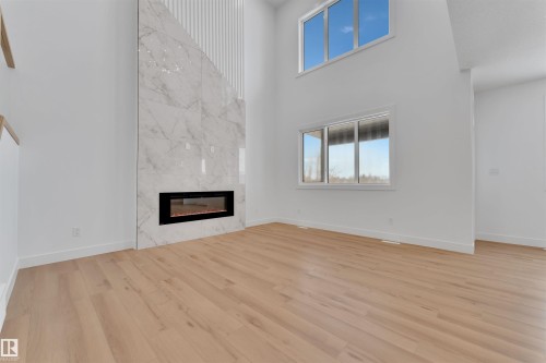 744 Astoria Way, Devon, AB - Indoor With Fireplace
