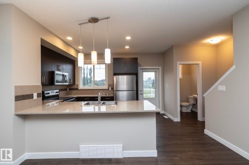22 13139 205 Street, Edmonton, AB - Indoor Photo Showing Kitchen With Double Sink