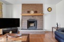 5508 54 Street, Beaumont, AB  - Indoor Photo Showing Living Room With Fireplace 