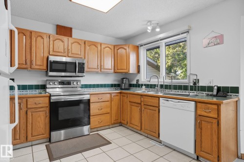 5508 54 Street, Beaumont, AB - Indoor Photo Showing Kitchen With Double Sink
