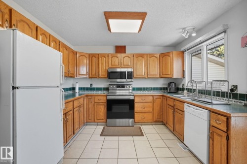 5508 54 Street, Beaumont, AB - Indoor Photo Showing Kitchen With Double Sink