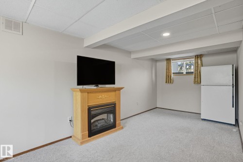5508 54 Street, Beaumont, AB - Indoor With Fireplace