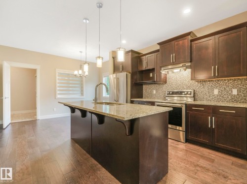 2 10319 120 Street, Edmonton, AB - Indoor Photo Showing Kitchen With Upgraded Kitchen