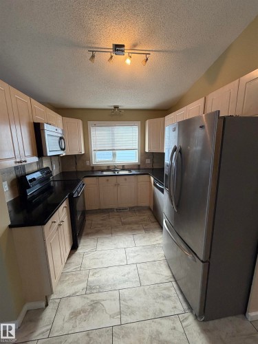 14827 47 Street, Edmonton, AB - Indoor Photo Showing Kitchen With Double Sink