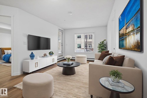 117 5804 Mullen Place, Edmonton, AB - Indoor Photo Showing Living Room