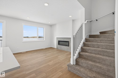 5008 72 Street, Beaumont, AB - Indoor With Fireplace