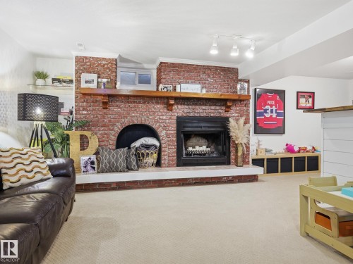 11 Leddy Avenue, St. Albert, AB - Indoor Photo Showing Living Room With Fireplace