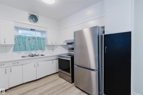 12026 104 Street, Edmonton, AB - Indoor Photo Showing Kitchen With Double Sink