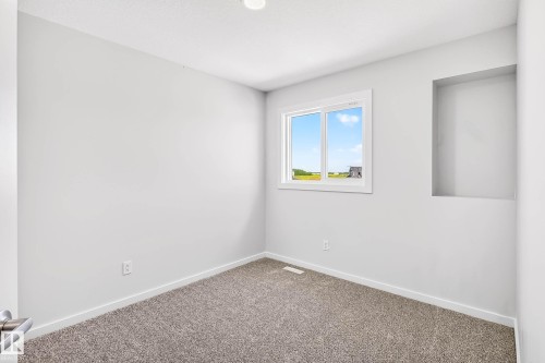 724 Southfork Drive, Leduc, AB - Indoor Photo Showing Other Room