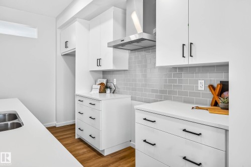 724 Southfork Drive, Leduc, AB - Indoor Photo Showing Kitchen With Double Sink