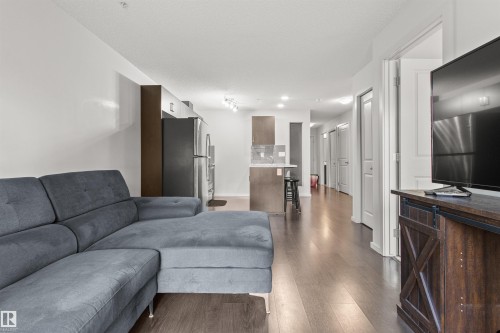 206 5521 7 Avenue, Edmonton, AB - Indoor Photo Showing Living Room
