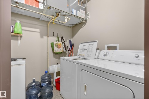 102 9803 96A Street, Edmonton, AB - Indoor Photo Showing Laundry Room