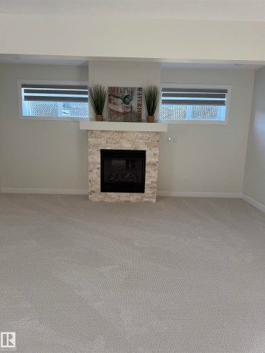 102 1 Street, Rural Lac Ste. Anne County, AB - Indoor With Fireplace
