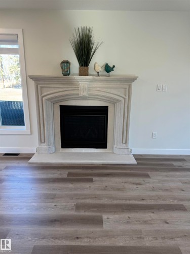 102 1 Street, Rural Lac Ste. Anne County, AB - Indoor With Fireplace