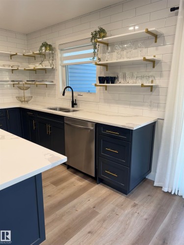 102 1 Street, Rural Lac Ste. Anne County, AB - Indoor Photo Showing Kitchen With Double Sink
