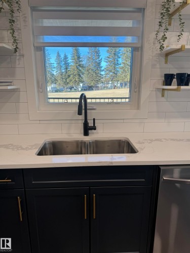 102 1 Street, Rural Lac Ste. Anne County, AB - Indoor Photo Showing Kitchen With Double Sink
