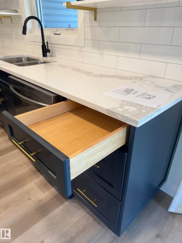 102 1 Street, Rural Lac Ste. Anne County, AB - Indoor Photo Showing Kitchen With Double Sink