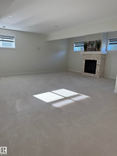 102 1 Street, Rural Lac Ste. Anne County, AB - Indoor With Fireplace