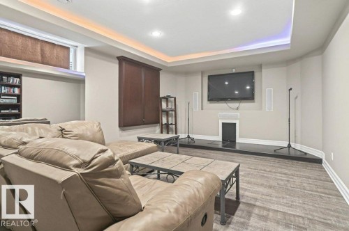 4835 Mactaggart Crest Crest, Edmonton, AB - Indoor With Fireplace