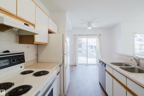 57 843 Youville Drive W, Edmonton, AB - Indoor Photo Showing Kitchen With Double Sink