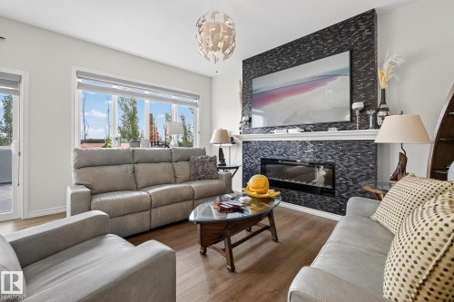 20023 26 Avenue, Edmonton, AB - Indoor Photo Showing Living Room With Fireplace