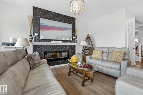 20023 26 Avenue, Edmonton, AB - Indoor Photo Showing Living Room With Fireplace