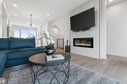 3284 Keswick Way, Edmonton, AB - Indoor Photo Showing Living Room With Fireplace