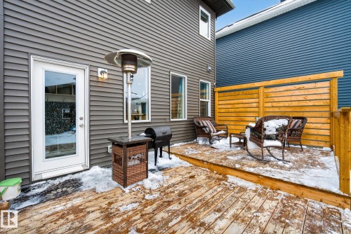This property features a spacious wooden deck, ideal for outdoor enjoyment - 8 Daniel Street, Fort Saskatchewan, AB - Outdoor With Deck Patio Veranda With Exterior