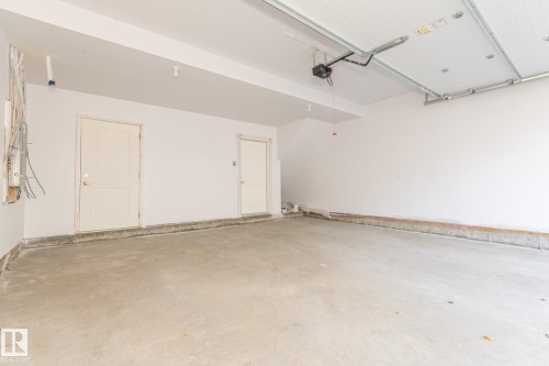 14 735 Allard Boulevard, Edmonton, AB - Indoor Photo Showing Garage