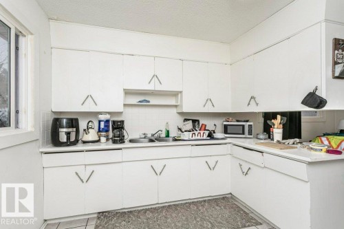 9324 120 Avenue, Edmonton, AB - Indoor Photo Showing Kitchen With Double Sink