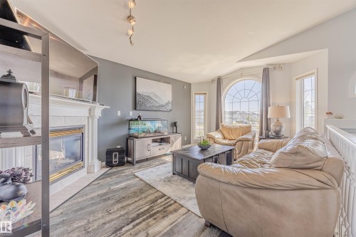 7808 163 Avenue, Edmonton, AB - Indoor Photo Showing Living Room With Fireplace