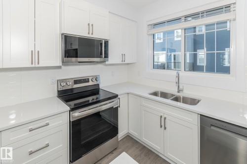 11 735 Allard Boulevard, Edmonton, AB - Indoor Photo Showing Kitchen With Double Sink