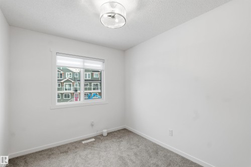 19 525 Secord Boulevard, Edmonton, AB - Indoor Photo Showing Other Room