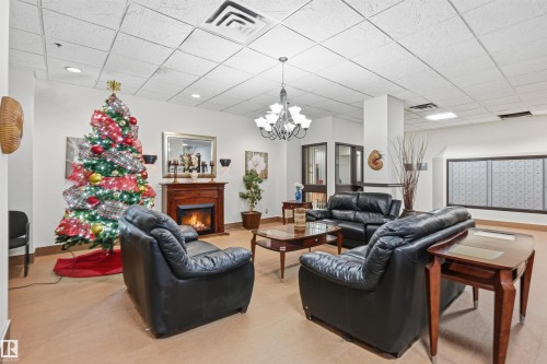 1808 10149 Saskatchewan Drive, Edmonton, AB - Indoor With Fireplace