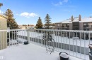 Snow covered building featuring a view of apartment building / complex - 305 32 Alpine Place, St. Albert, AB  - Outdoor With Facade 