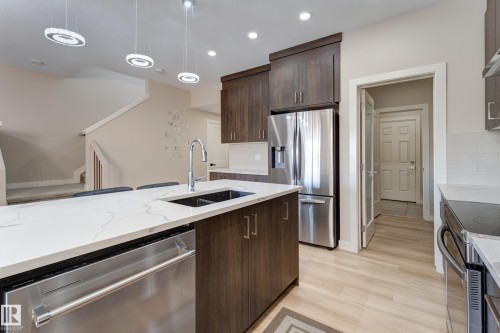 1459 Cherniak Way, Edmonton, AB - Indoor Photo Showing Kitchen With Stainless Steel Kitchen With Double Sink With Upgraded Kitchen