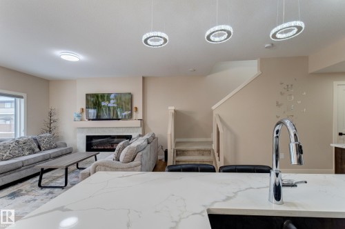 1459 Cherniak Way, Edmonton, AB - Indoor With Fireplace