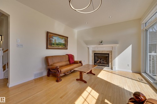 11729 71A Avenue, Edmonton, AB - Indoor Photo Showing Living Room With Fireplace