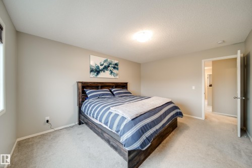9040 Cooper Link, Edmonton, AB - Indoor Photo Showing Bedroom