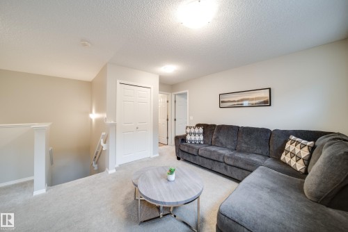 9040 Cooper Link, Edmonton, AB - Indoor Photo Showing Living Room
