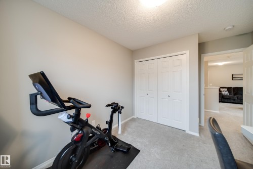 9040 Cooper Link, Edmonton, AB - Indoor Photo Showing Gym Room