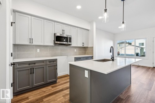 18936 28 Avenue, Edmonton, AB - Indoor Photo Showing Kitchen With Double Sink With Upgraded Kitchen