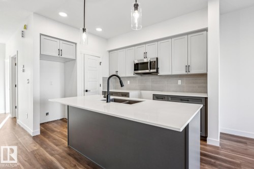 18936 28 Avenue, Edmonton, AB - Indoor Photo Showing Kitchen With Double Sink With Upgraded Kitchen