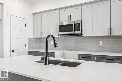 18936 28 Avenue, Edmonton, AB - Indoor Photo Showing Kitchen With Double Sink With Upgraded Kitchen