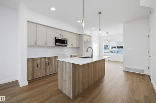 4570 Warbler Loop, Edmonton, AB - Indoor Photo Showing Kitchen With Upgraded Kitchen