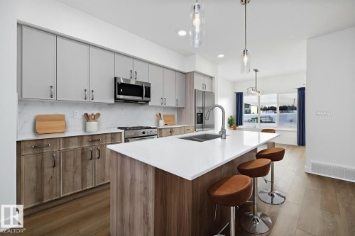 4570 Warbler Loop, Edmonton, AB - Indoor Photo Showing Kitchen With Double Sink With Upgraded Kitchen